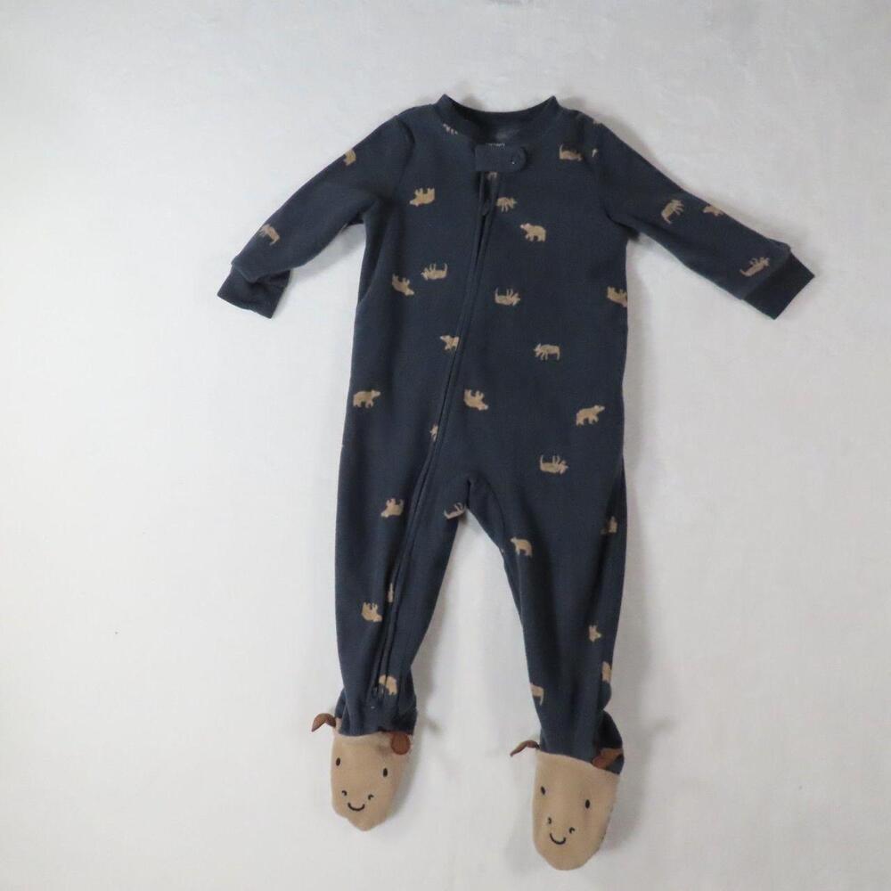 The Carters Bedtime Baby Boy Fleece Footed Pajamas in Navy Blue are a cozy and a
